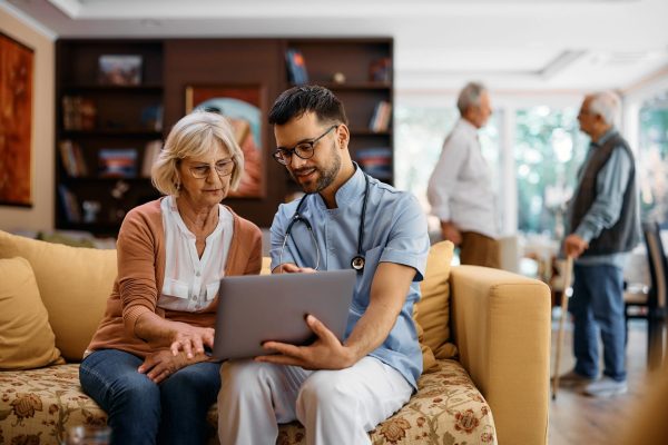 Senior,Woman,Surfing,The,Net,On,Laptop,With,Help,Of